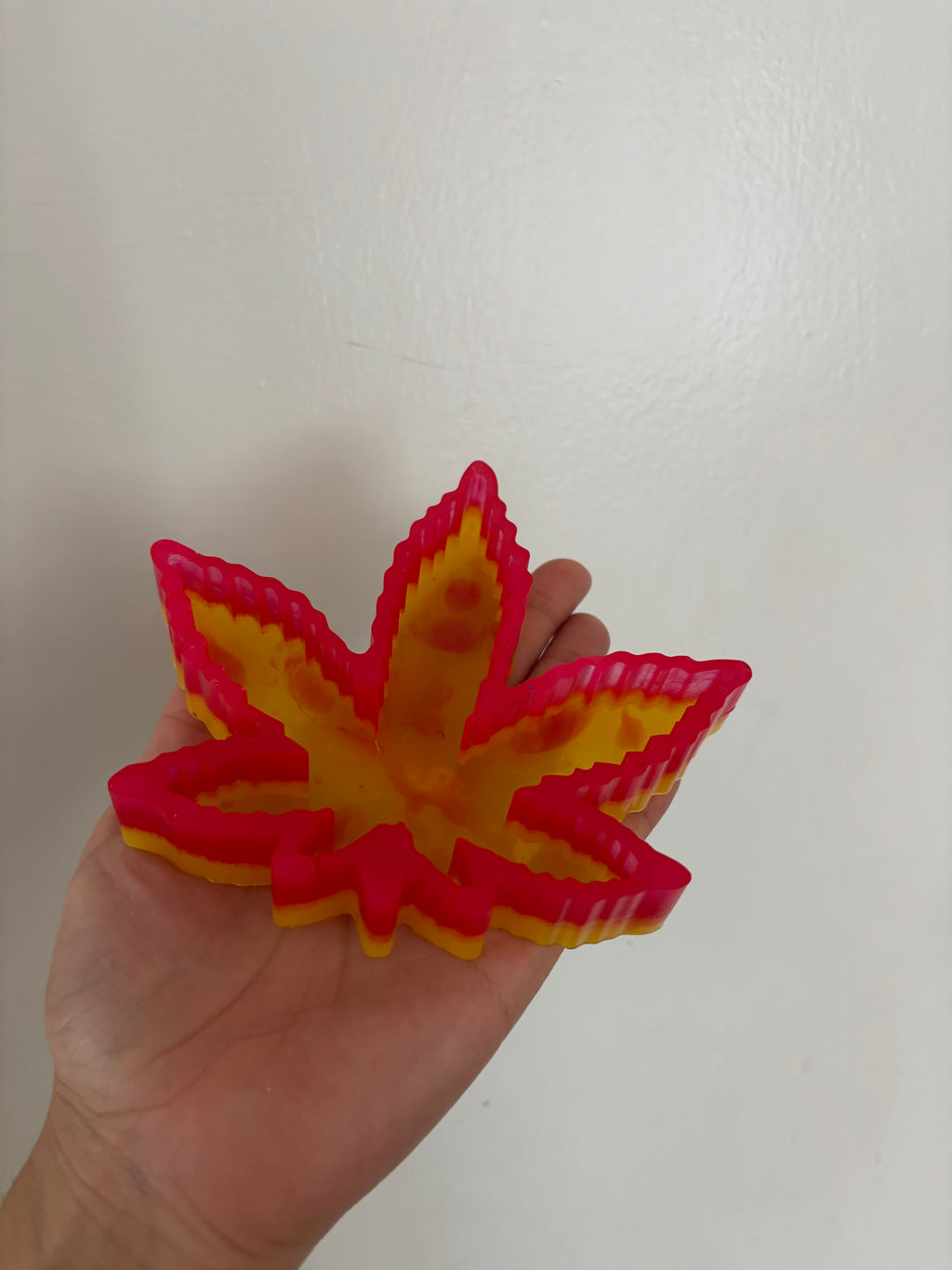 Custom pink and yellow ashtray